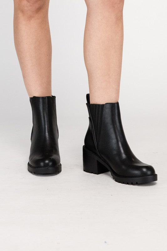 Black leather ankle booties for women