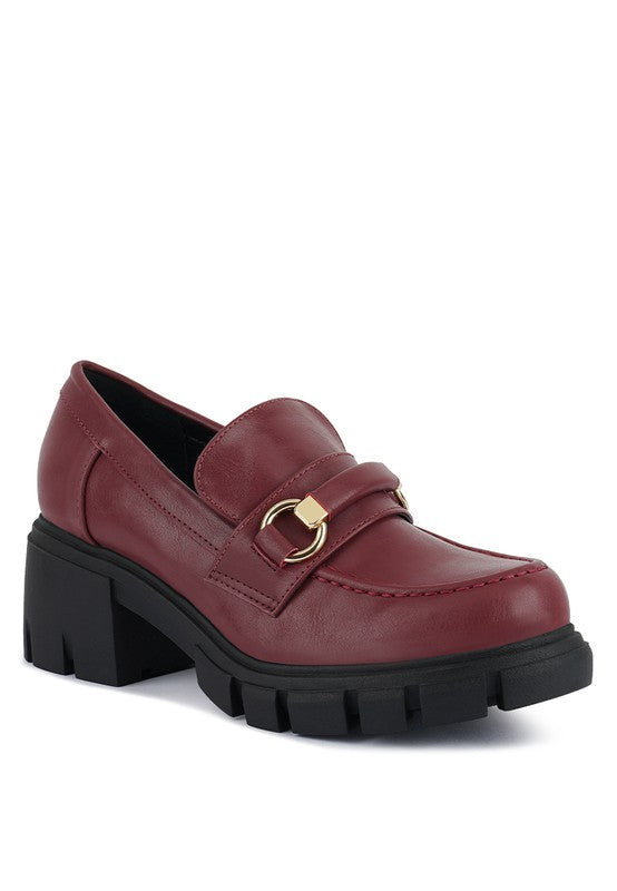 red chunky loafers with gold buckle from Holocene