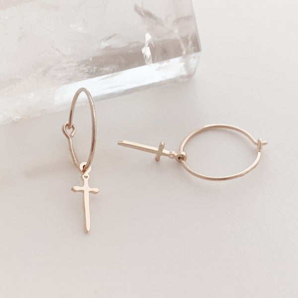 Minimalist, skinny hoops accented with tiny dagger charms