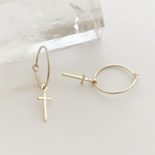 Minimalist, skinny hoops accented with tiny dagger charms