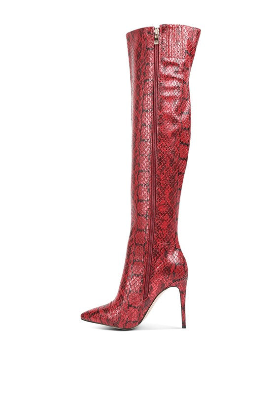 Snake pattern knee heel boots. Made with leather for women