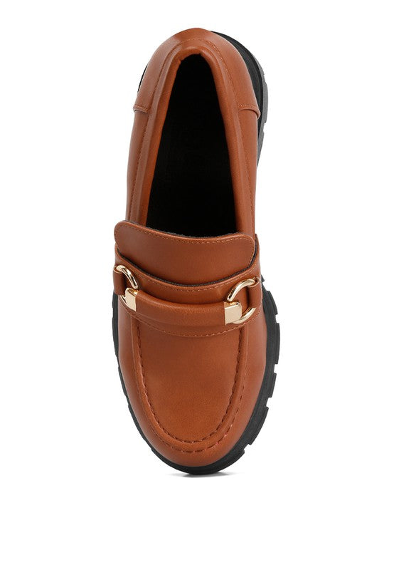tan chunky loafers with gold buckle from Holocene