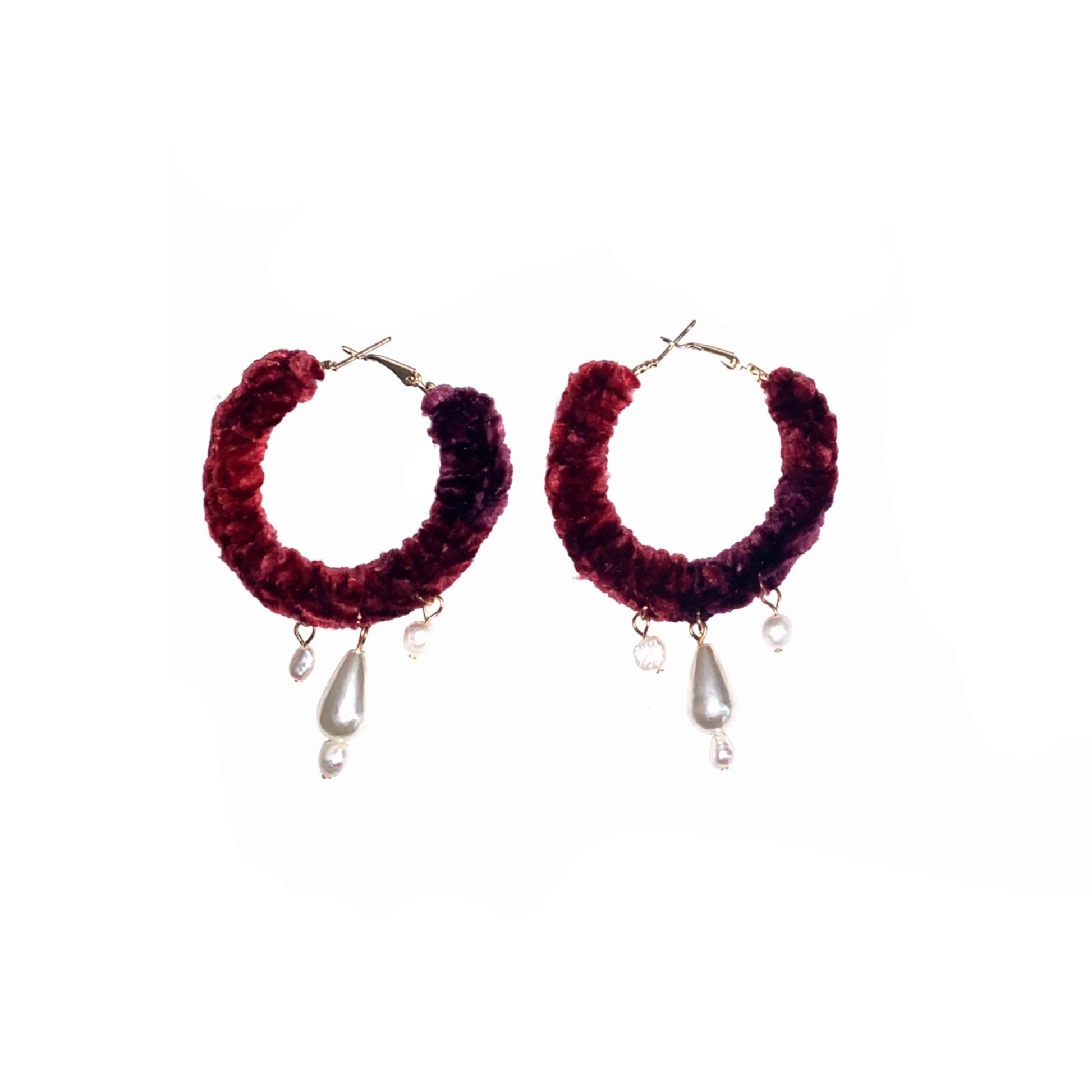 Crochet hoop earrings with charm adornments