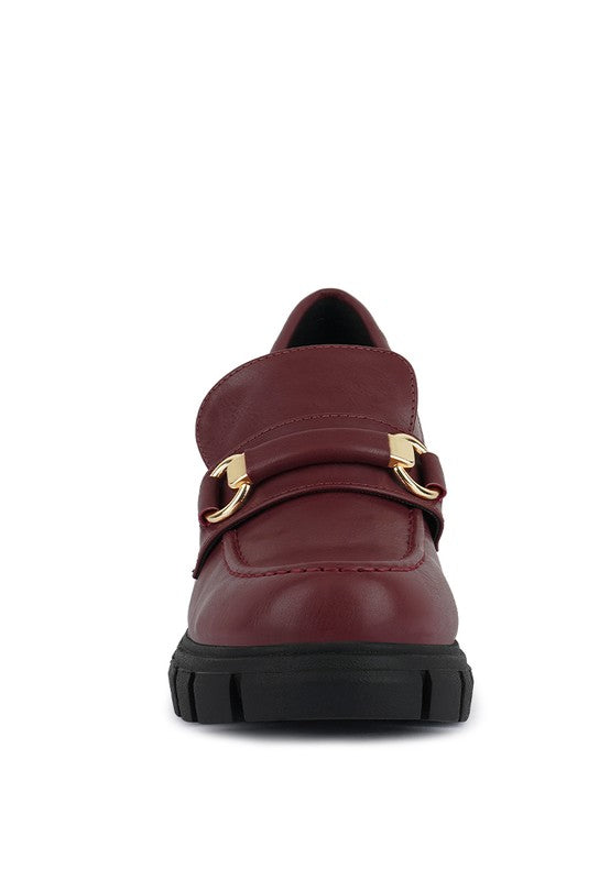 chunky loafers with gold buckle from Holocene