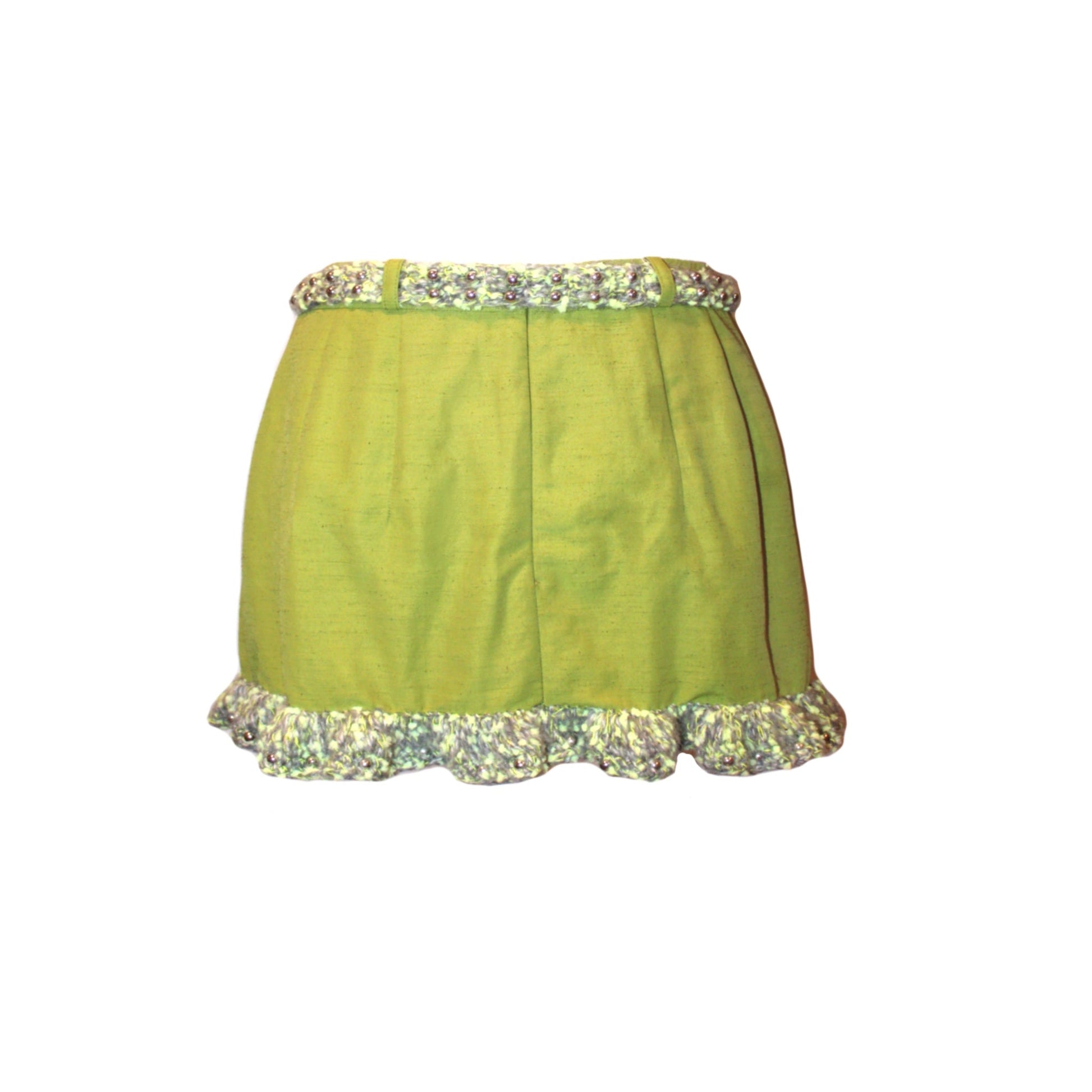 Lime green mini skirt with crochet ruffles and crochet belt.