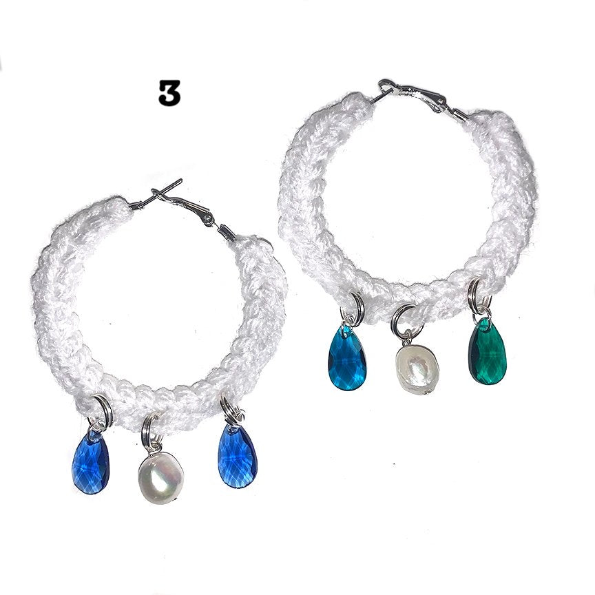 Crochet hoop earrings with charm adornments