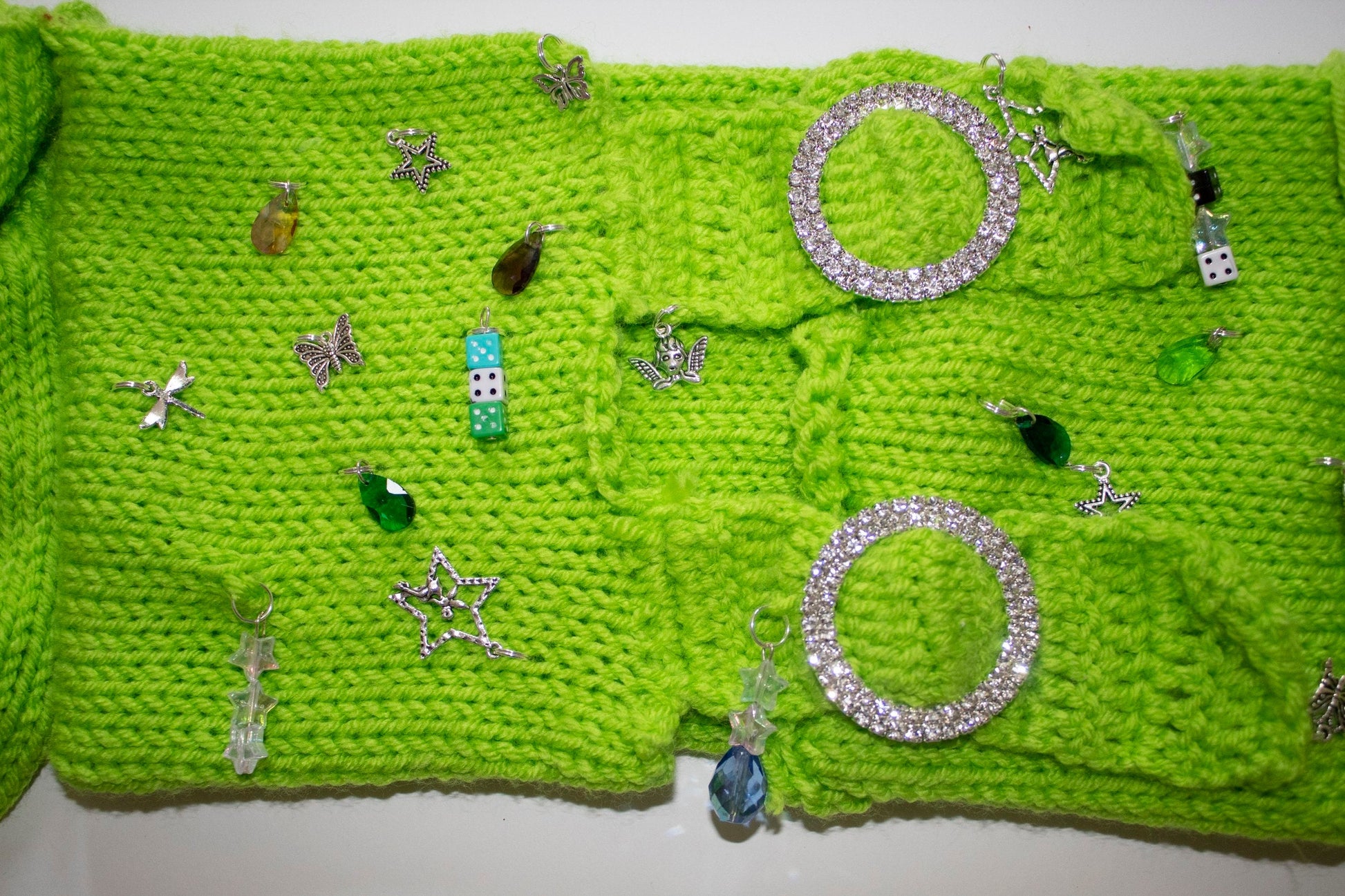 Green crochet off the shoulder crop top with charm adornments