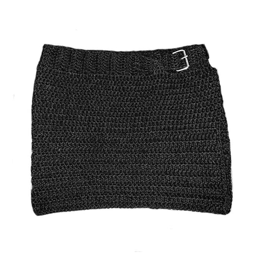 Black crochet mini skirt with low rise waist, high-leg slit and buckle closure