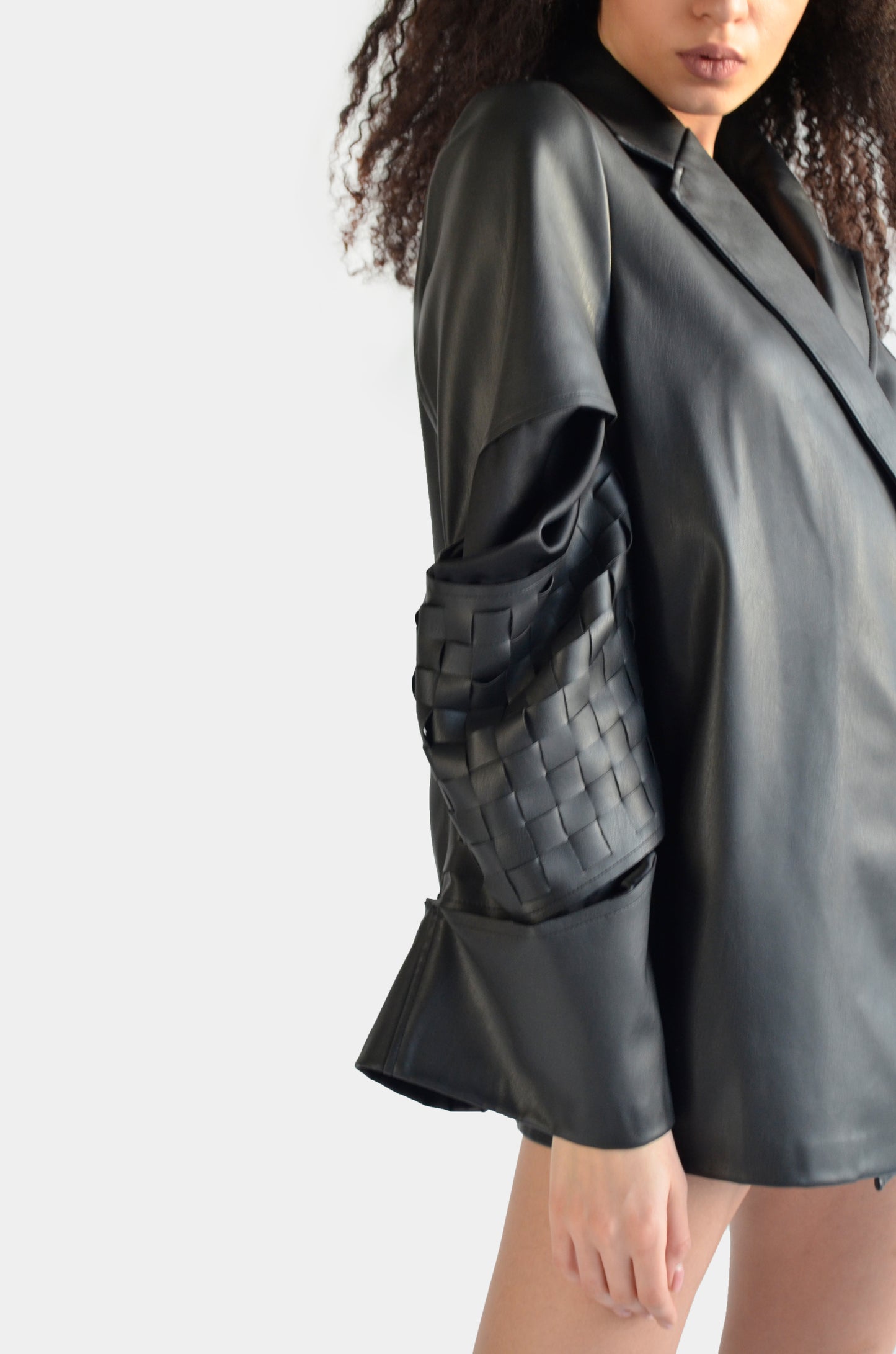 Black eco leather jacket blazer with weaving detail on the sleeves for women by Holocene