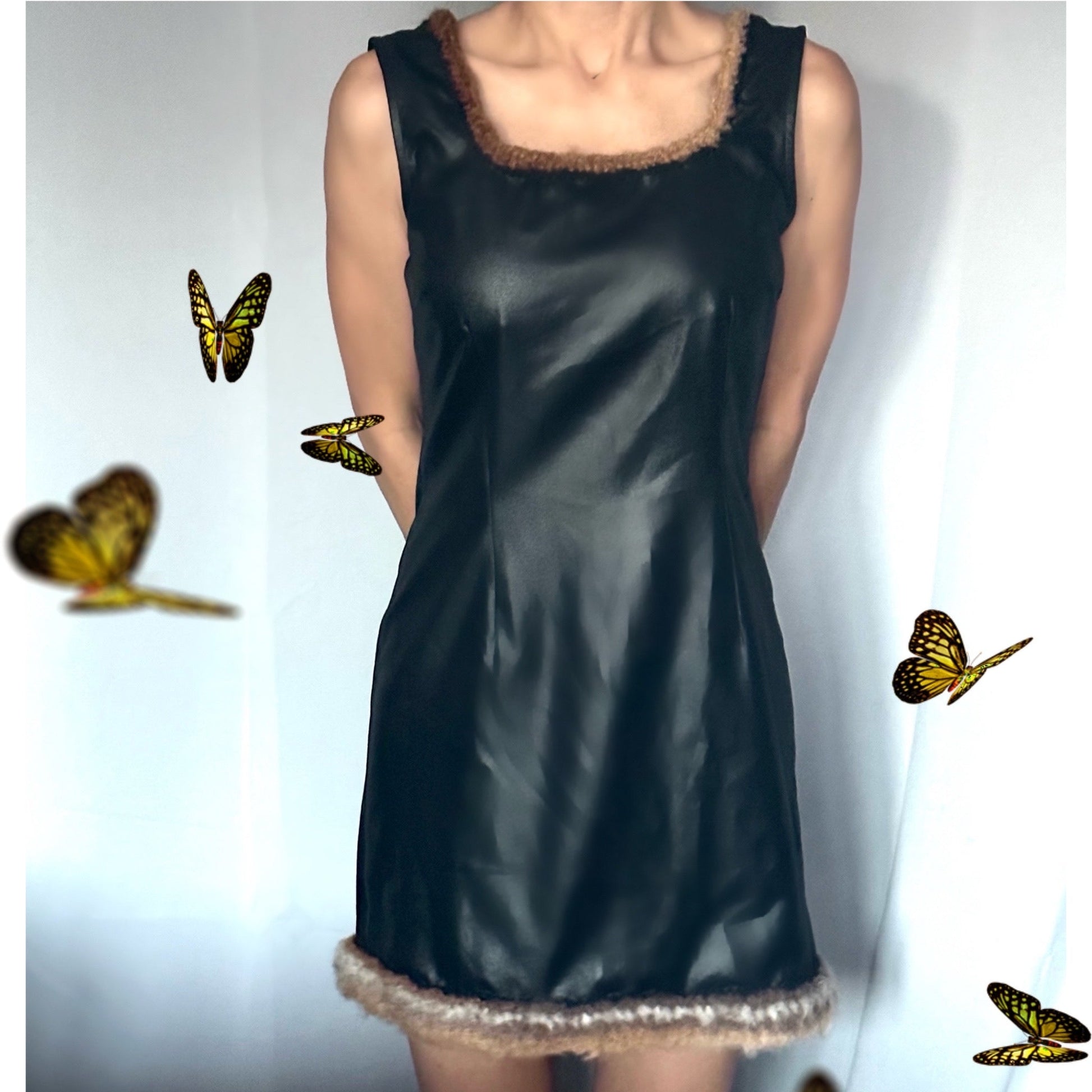 Black faux leather mini dress with fur trim