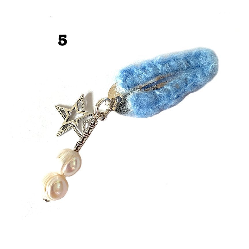 Fuzzy hair clips with decorative charms