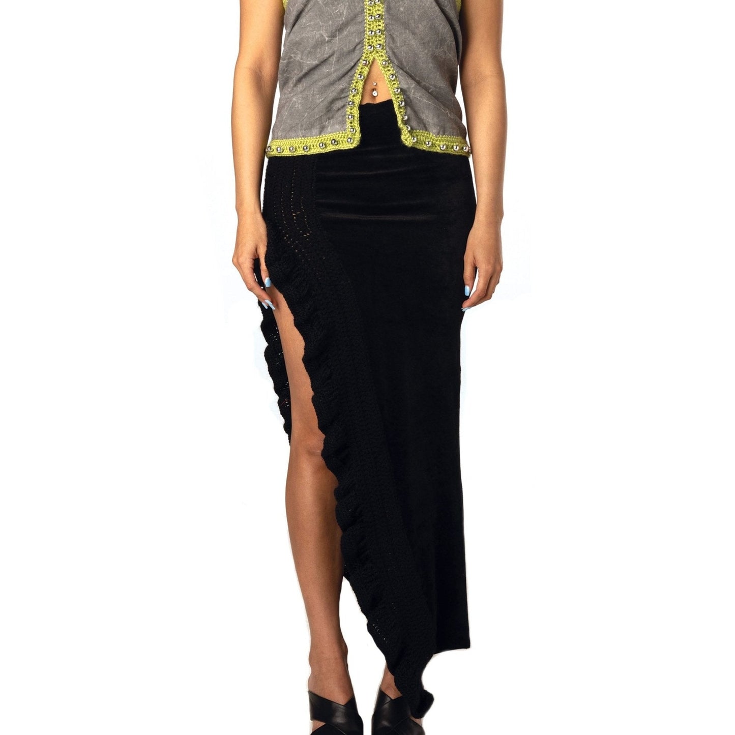 Black knit ruffle maxi skirt with thigh slit by Bailey Prado