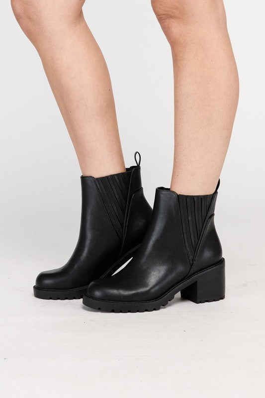 Black leather ankle booties for women