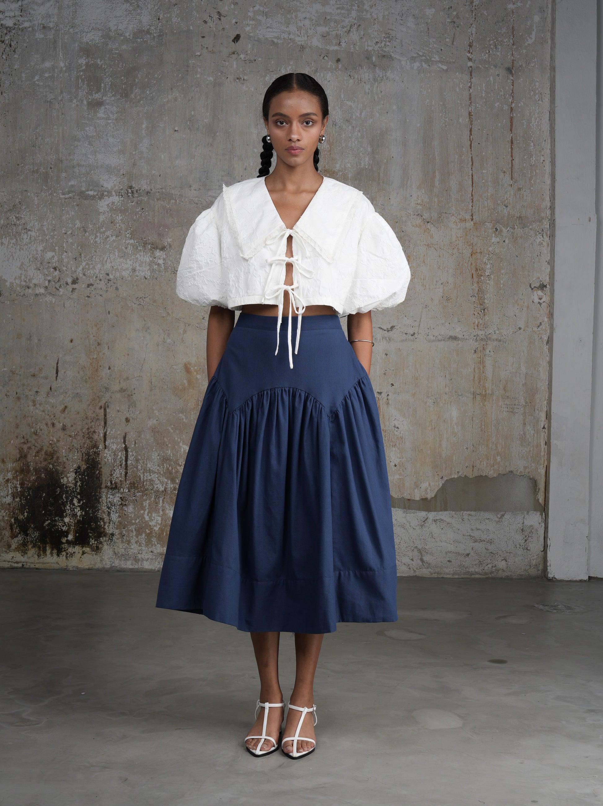 Navy blue linen midi skirt by Lagemma. A-line style for volume 