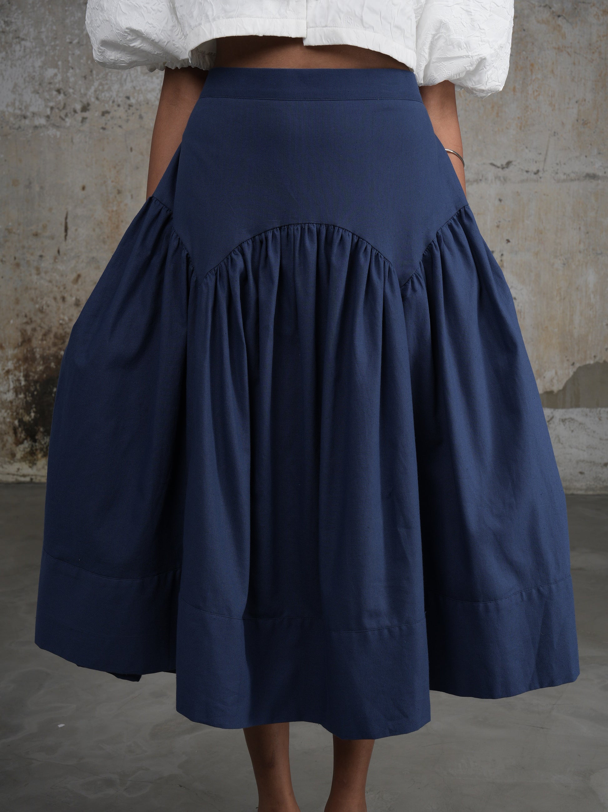 Navy blue linen midi skirt by Lagemma. A-line style for volume 