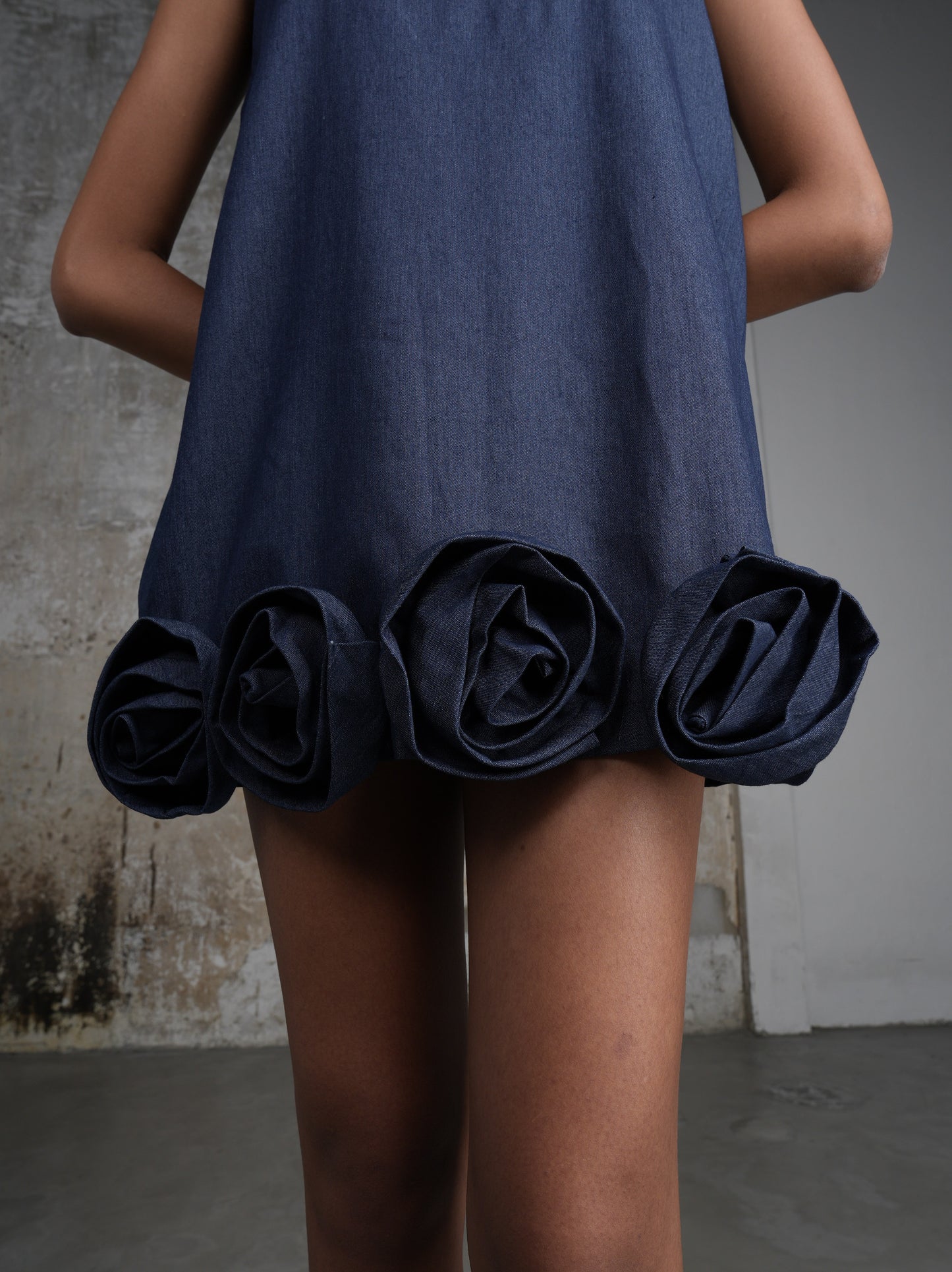 mini denim dress with roses on hem