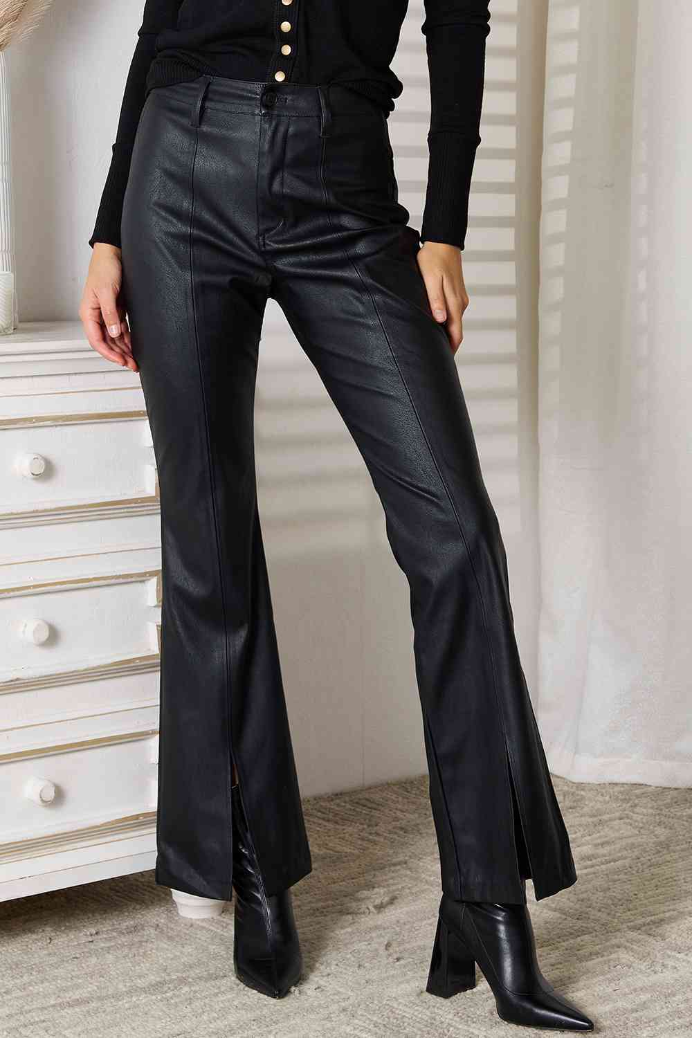 Black leather flare pants with slit for women